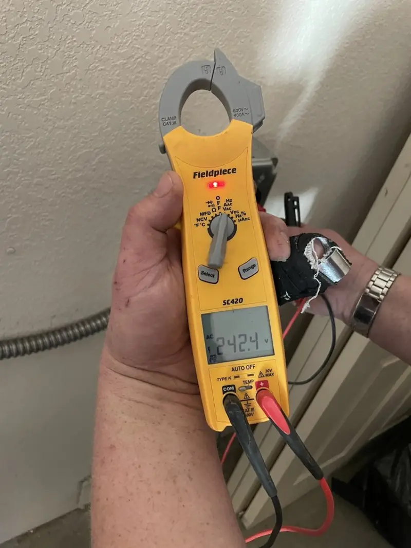 Voltage testing with clamp meter during Generator Installation in East Goshen